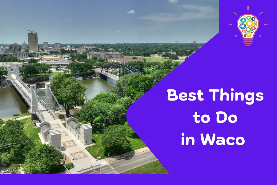 Aerial view of downtown Waco, Texas with the Waco Suspension Bridge crossing the Brazos River, showcasing the city’s scenic beauty and historical landmarks.