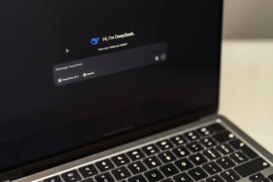 A close-up of a laptop screen showing privacy settings for an AI application