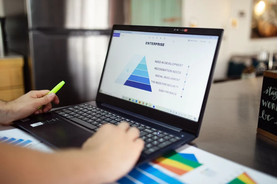 Visual Workflow Planning A beginner reviewing a visual workflow diagram on a laptop screen